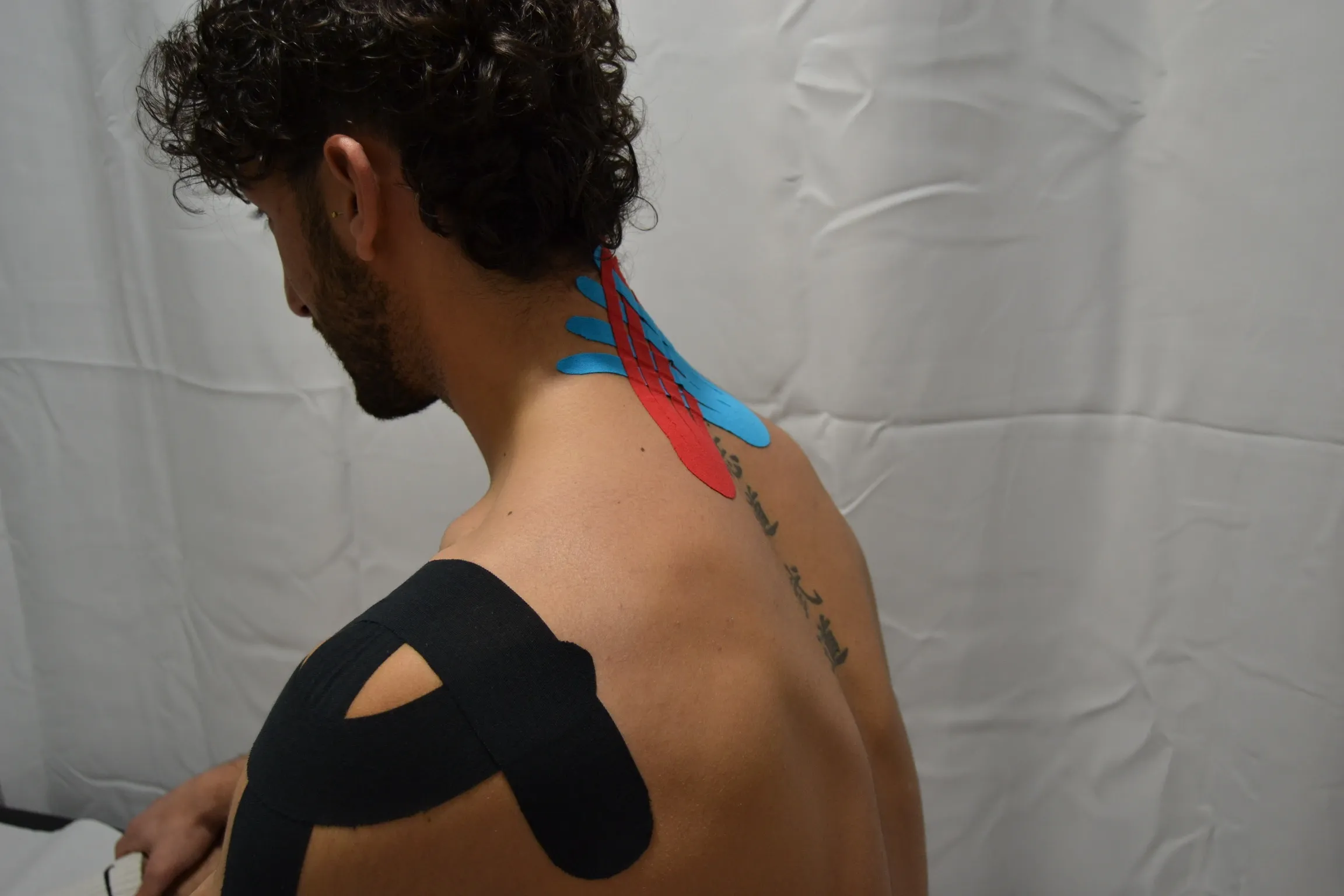 Taping (Vendaje elástico)